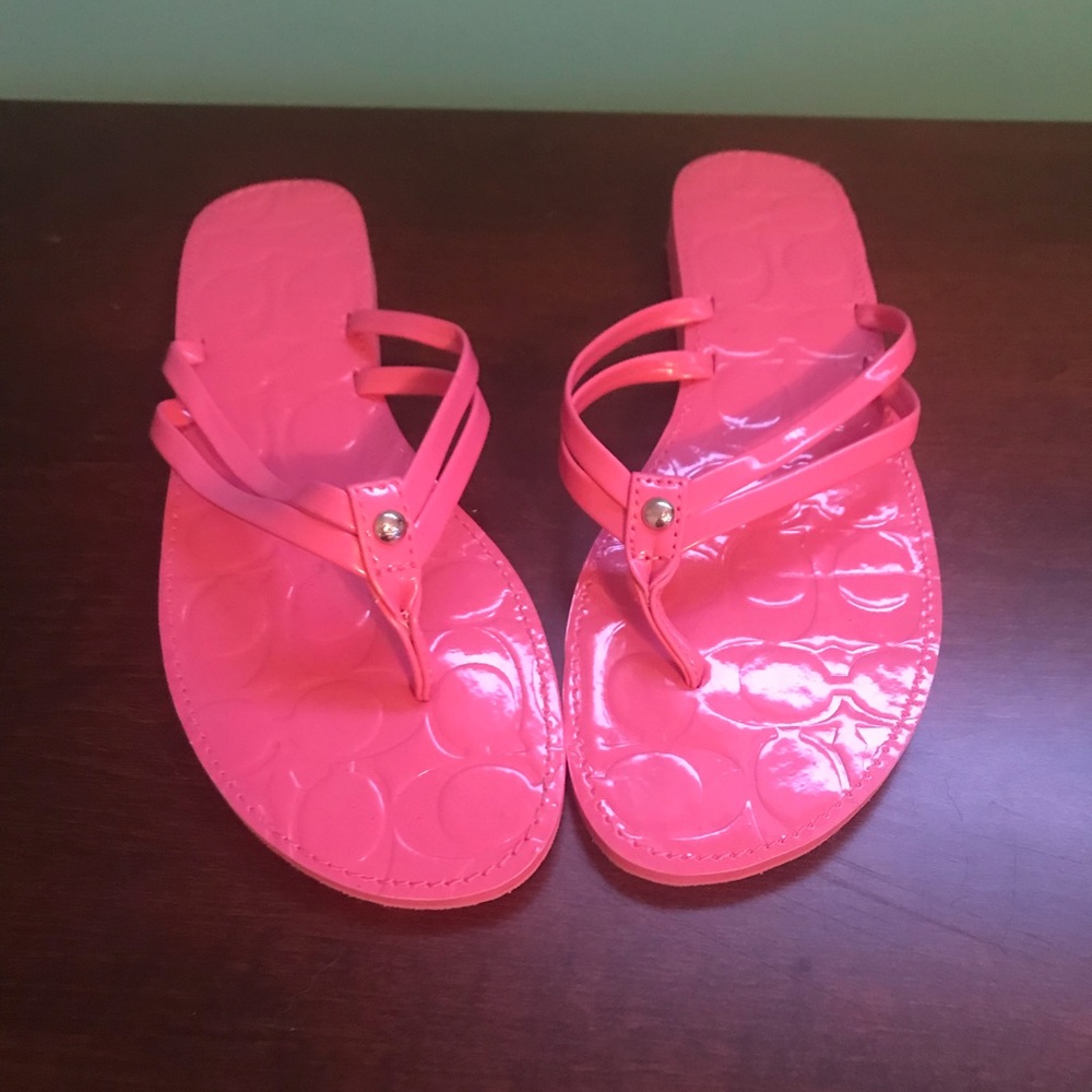 Coach Juney pink patent leather flip flops